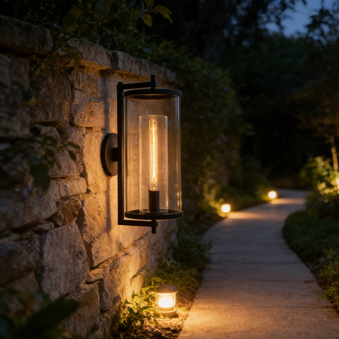 Outdoor wall light fixture on a stone wall with a warm glow