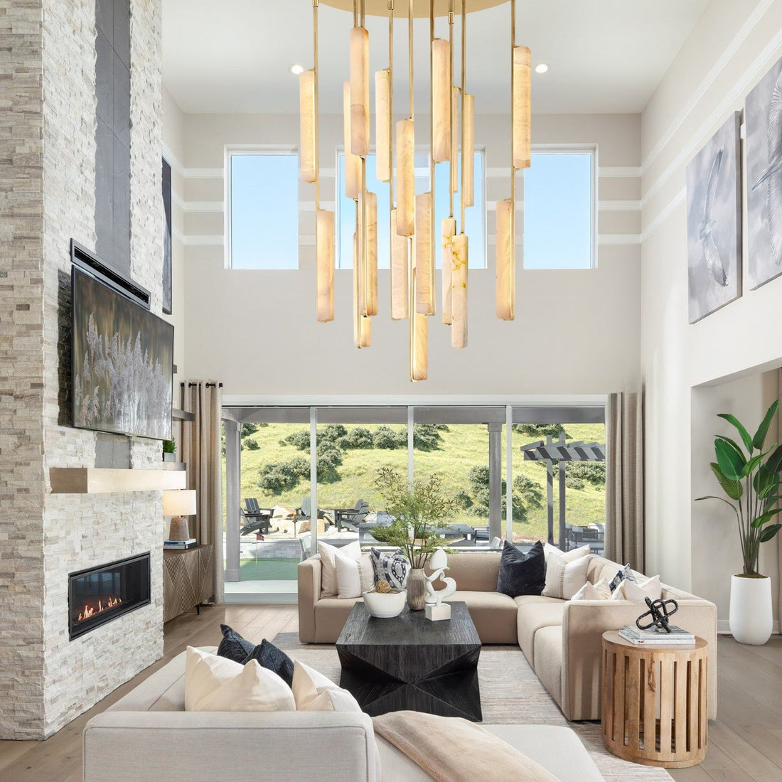 Modern living room with a fireplace, sectional sofa, and decorative elements.