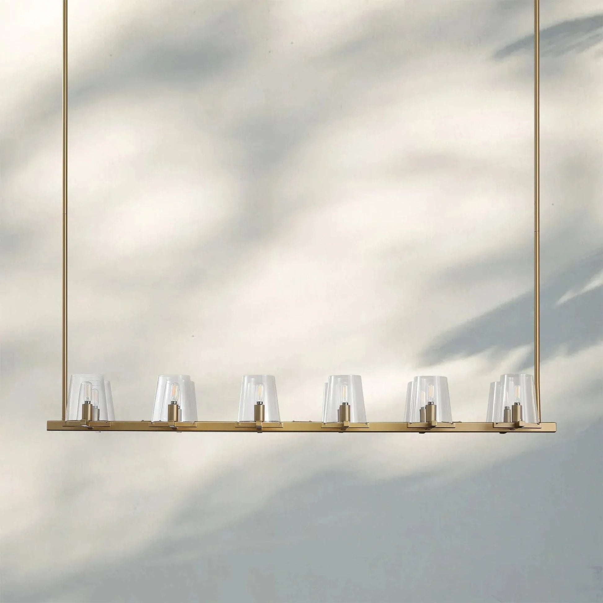 Pauilla Claar Glass Linear Chandelier-Linear 49" 10-Ligth-Lacquered Burnished Brass-