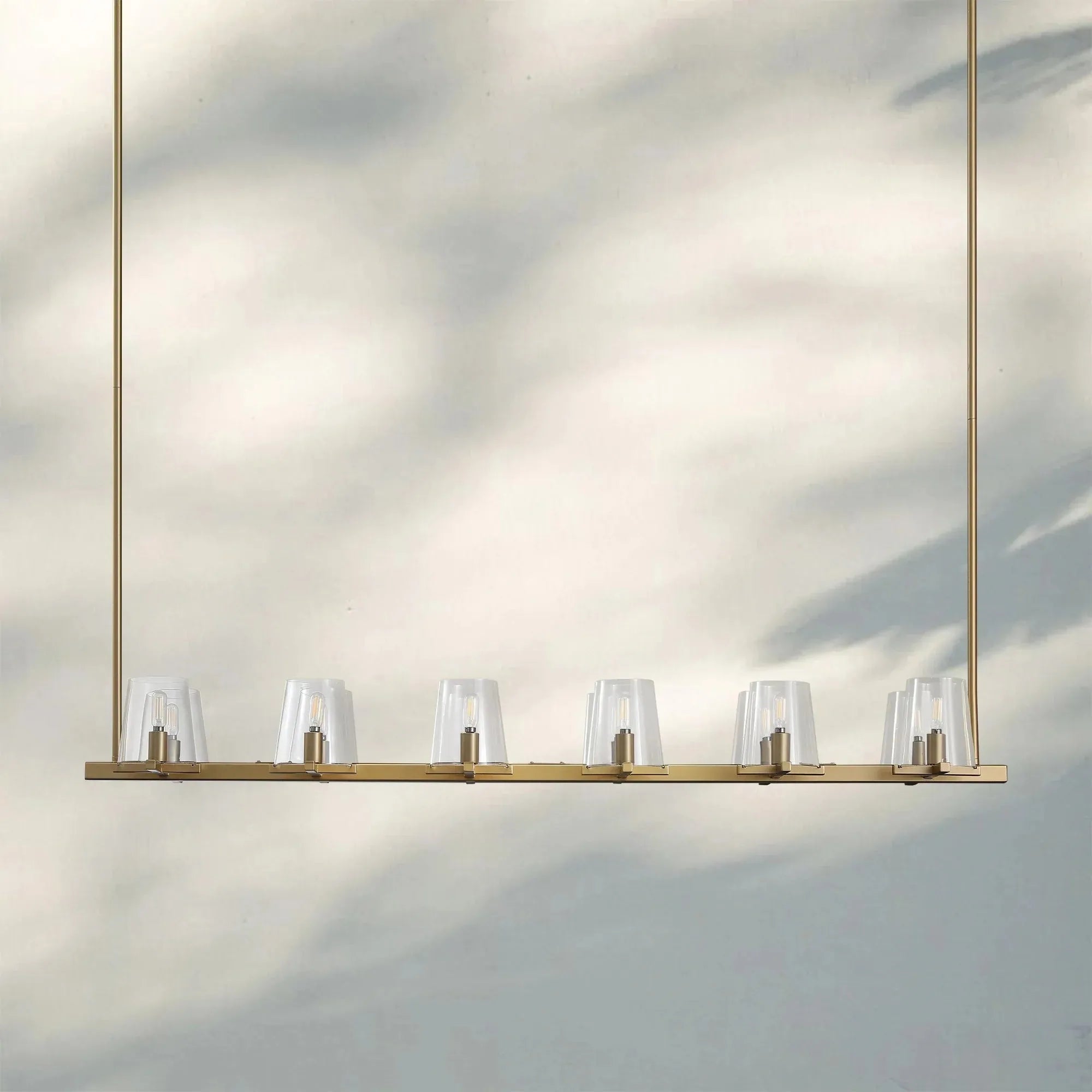 Pauilla Claar Glass Linear Chandelier-Linear 49" 10-Ligth-Lacquered Burnished Brass-